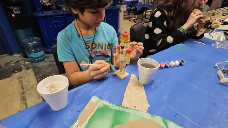 Young makers working with clay