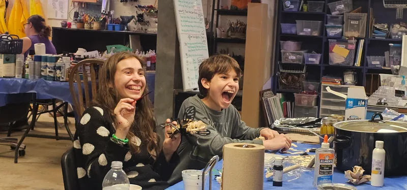 Young makers with the pieces they built
