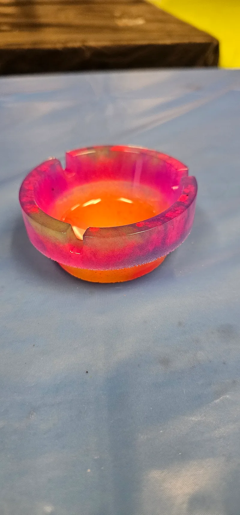 Resin bowls glowing under ultraviolet light